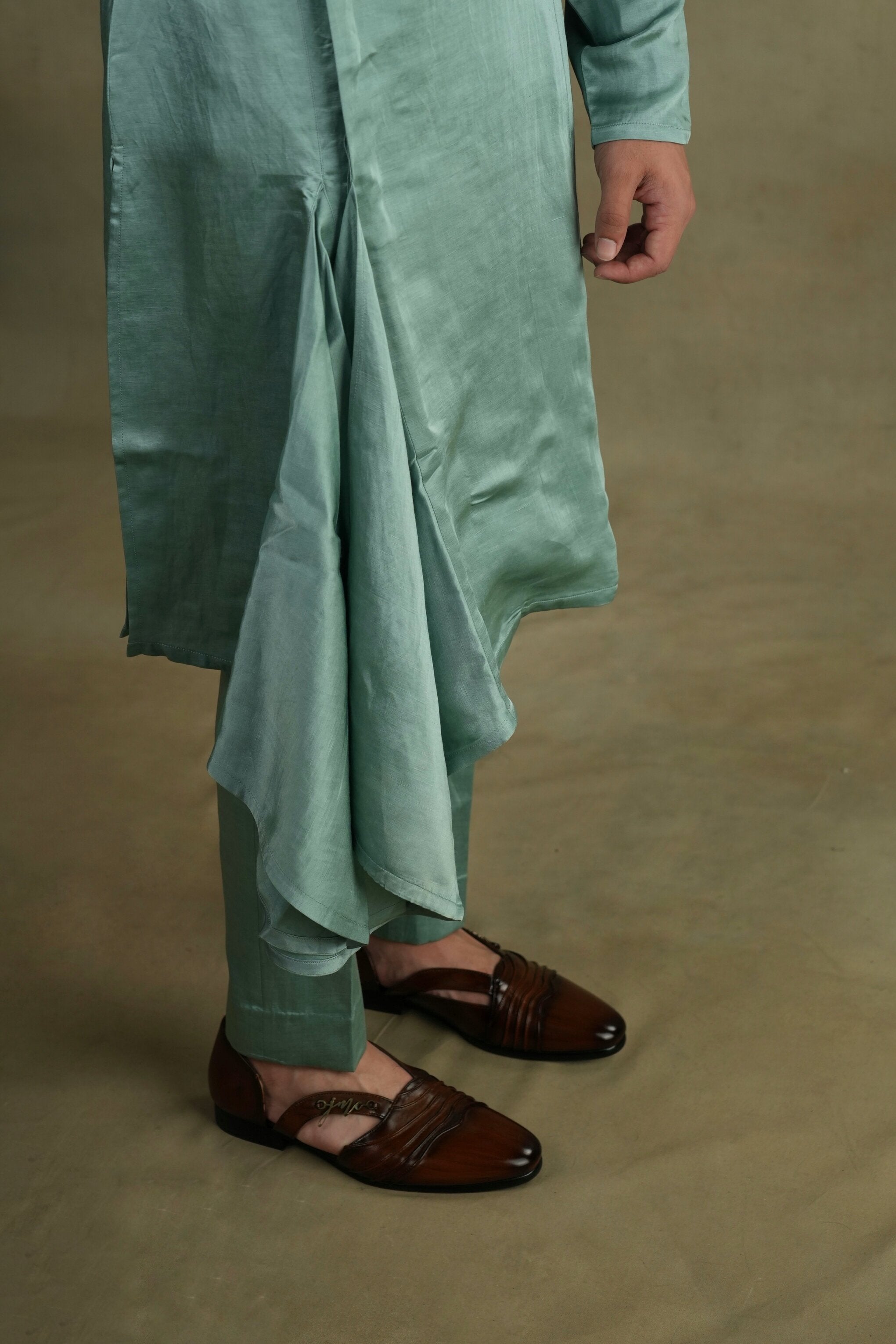 Chic Chateau Drape Kurta Set with a flowing draped tunic adorned with subtle floral motifs, paired with palazzo pants for a graceful and feminine look.