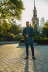 Teal blue bandhgala with colorful resham thread detailing and tone-on-tone embroidery, paired with a matching shirt kurta and tapered trousers