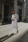 Back view of the Lilac Blush sherwani, showcasing the subtle grey-lilac hue and refined embroidery work