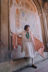 Ivory open sherwani in linen silk with tone-on-tone floral embroidery, paired with an anarkali kurta, churidar, embroidered kamarbandh, and an old rose stole