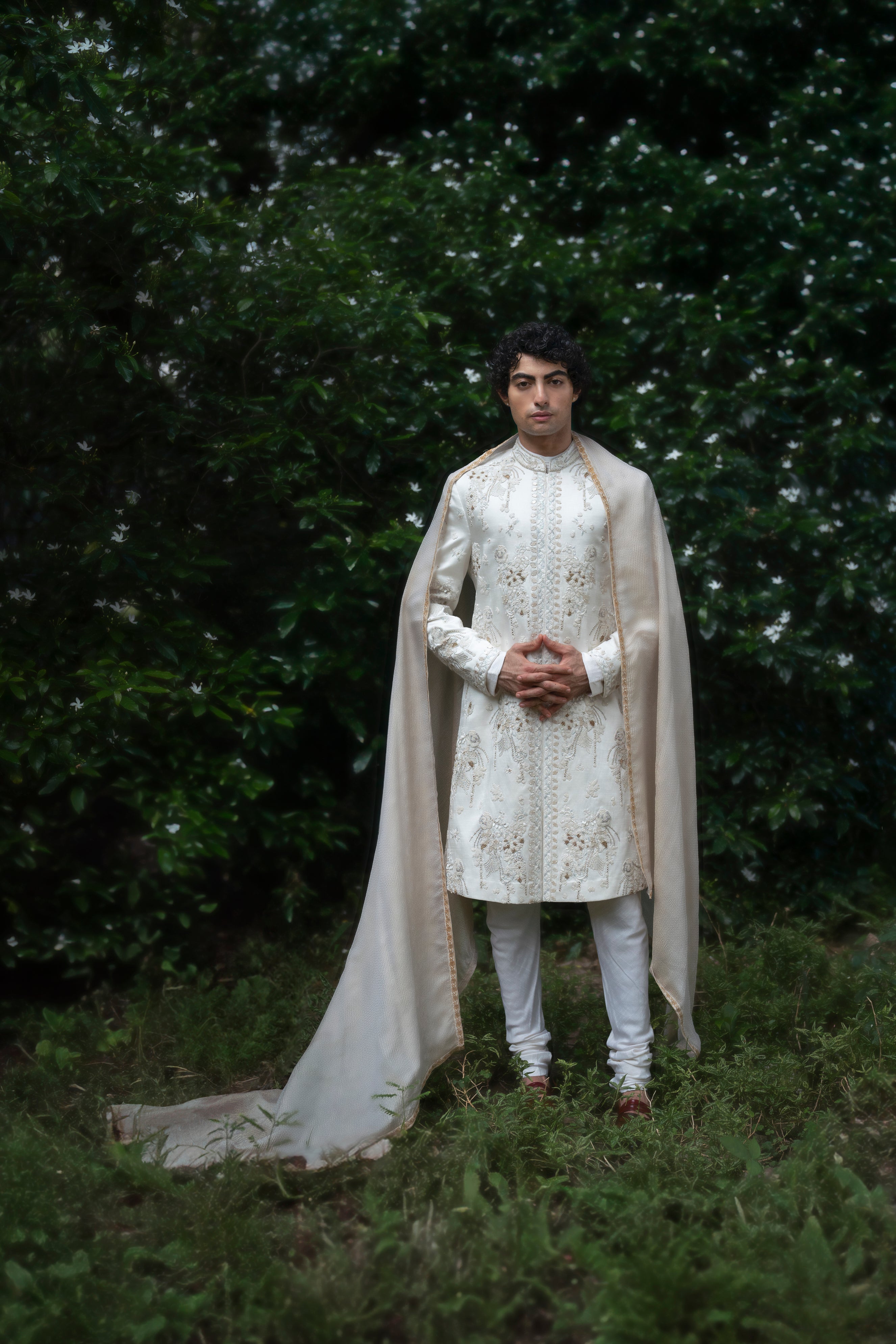 Front view of the Wisteria White sherwani made from linen silk, featuring tone-on-tone 3D floral embroidery with intricate dori work and thread detailing