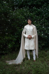 Front view of the Wisteria White sherwani made from linen silk, featuring tone-on-tone 3D floral embroidery with intricate dori work and thread detailing