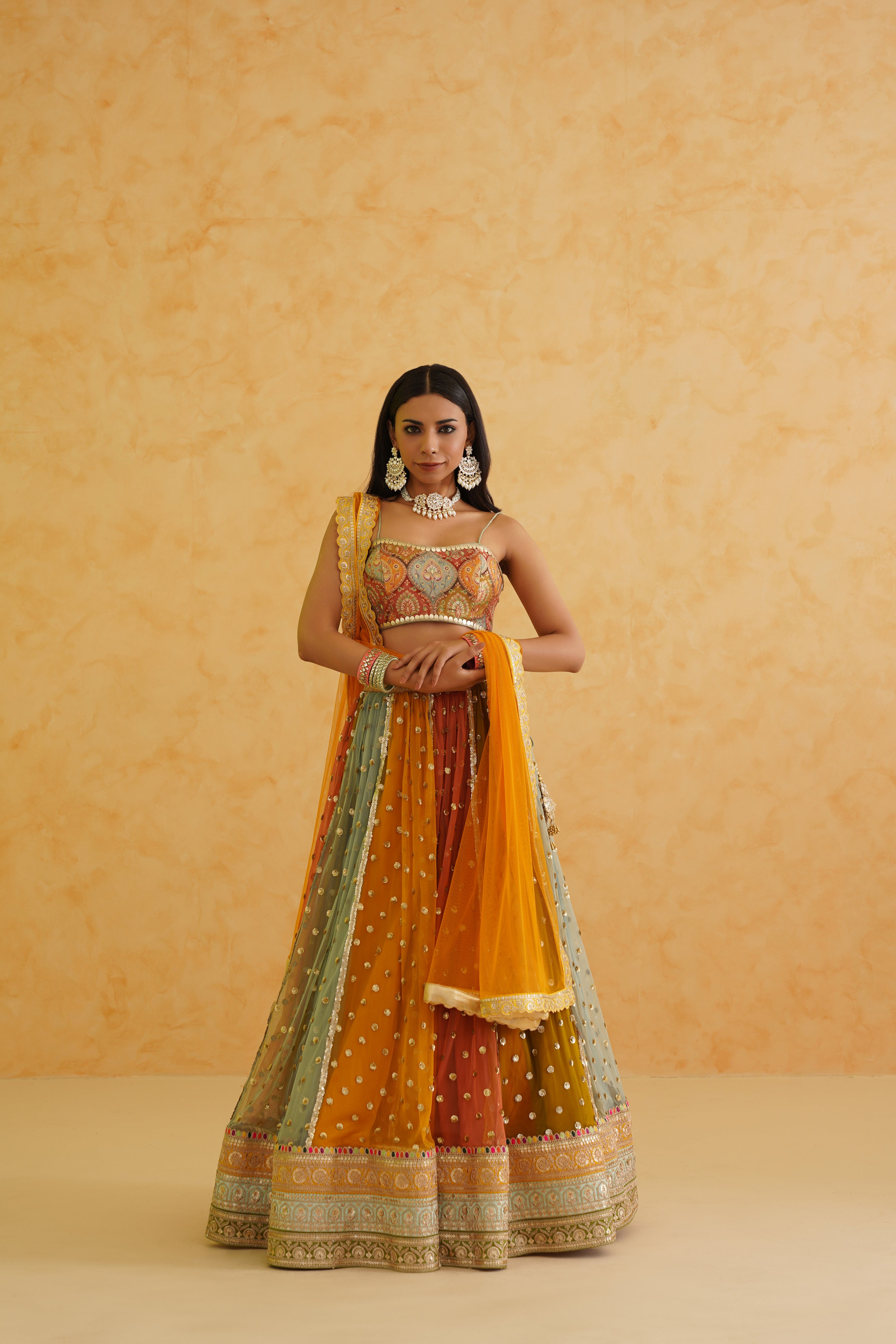 Beautifully designed multi-colored lehenga set showcasing a luxurious net fabric that enhances comfort and style.