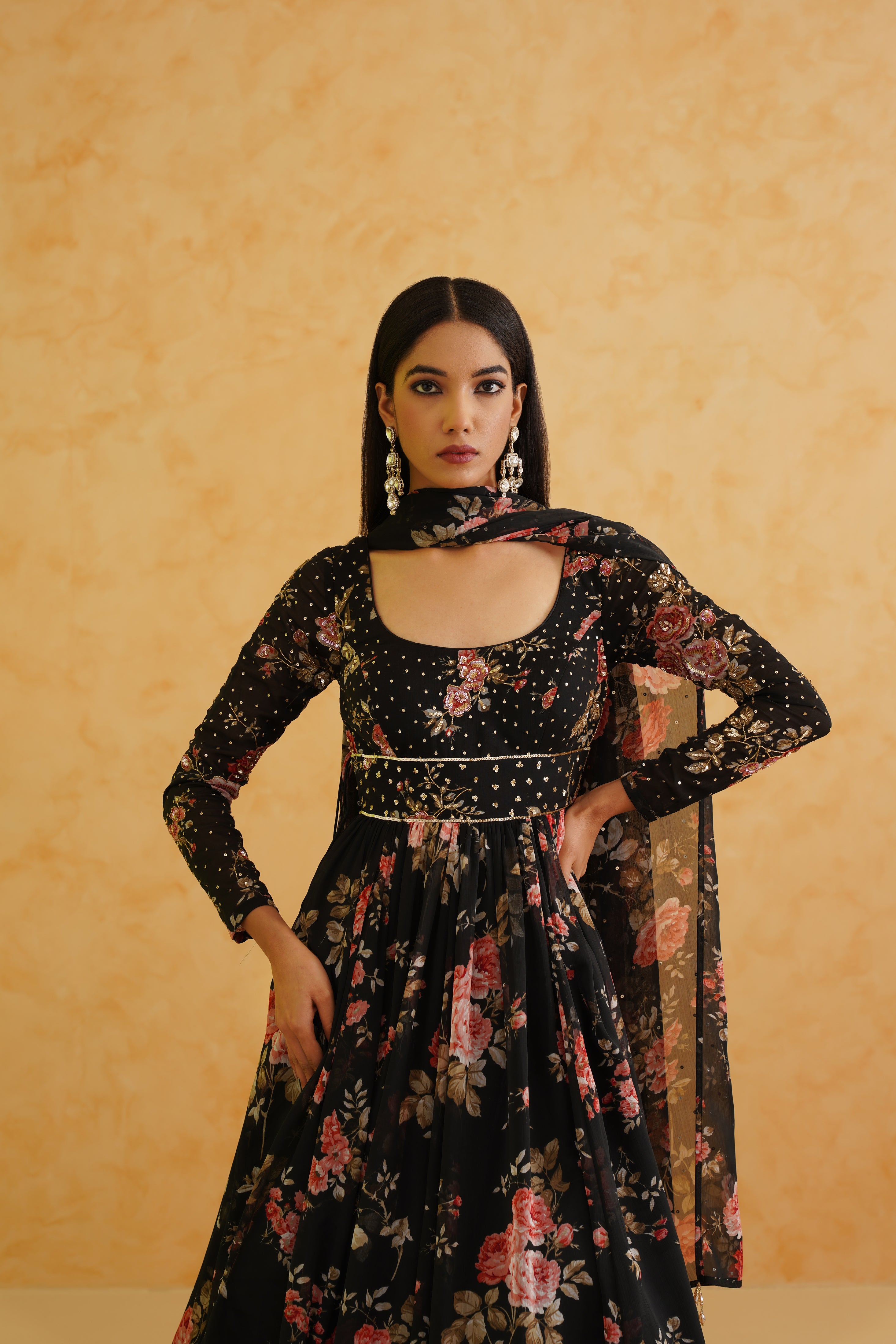 Black printed anarkali and churidar set with matching georgette dupatta, perfect for a sophisticated and glamorous evening look.