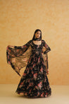 Glamorous black georgette anarkali and churidar set, complete with a printed dupatta for a refined and comfortable look.