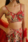 Luxury red lehenga with intricate crystal, sequin, and beadwork for a glamorous look.