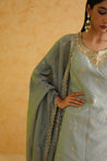 A modern and stylish grey sharara set perfect for special occasions.