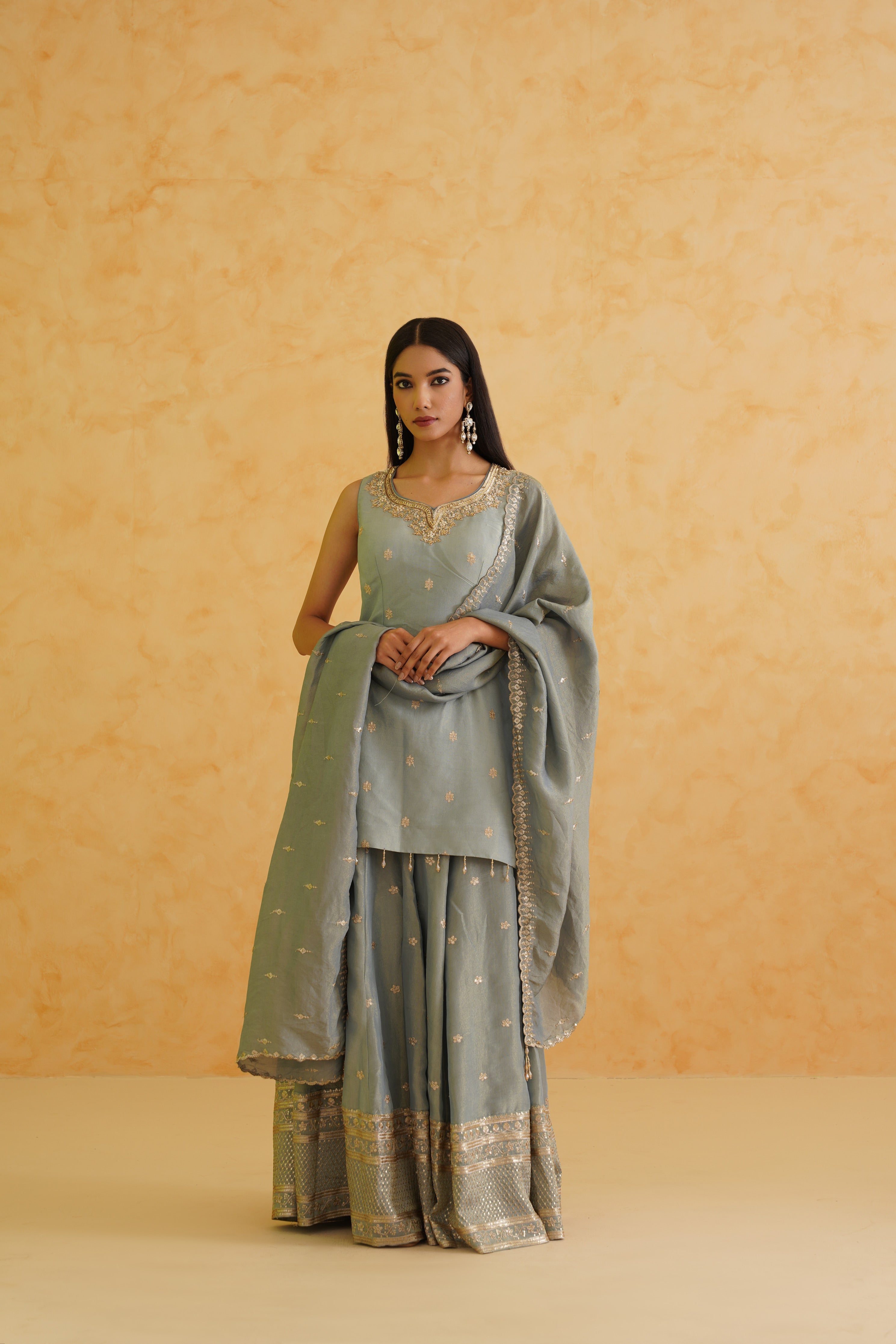 A timeless grey sharara with a touch of luxury and elegance.