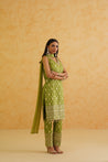 A luxurious green brocade kurti with intricate crystal, stone, and sequin work.