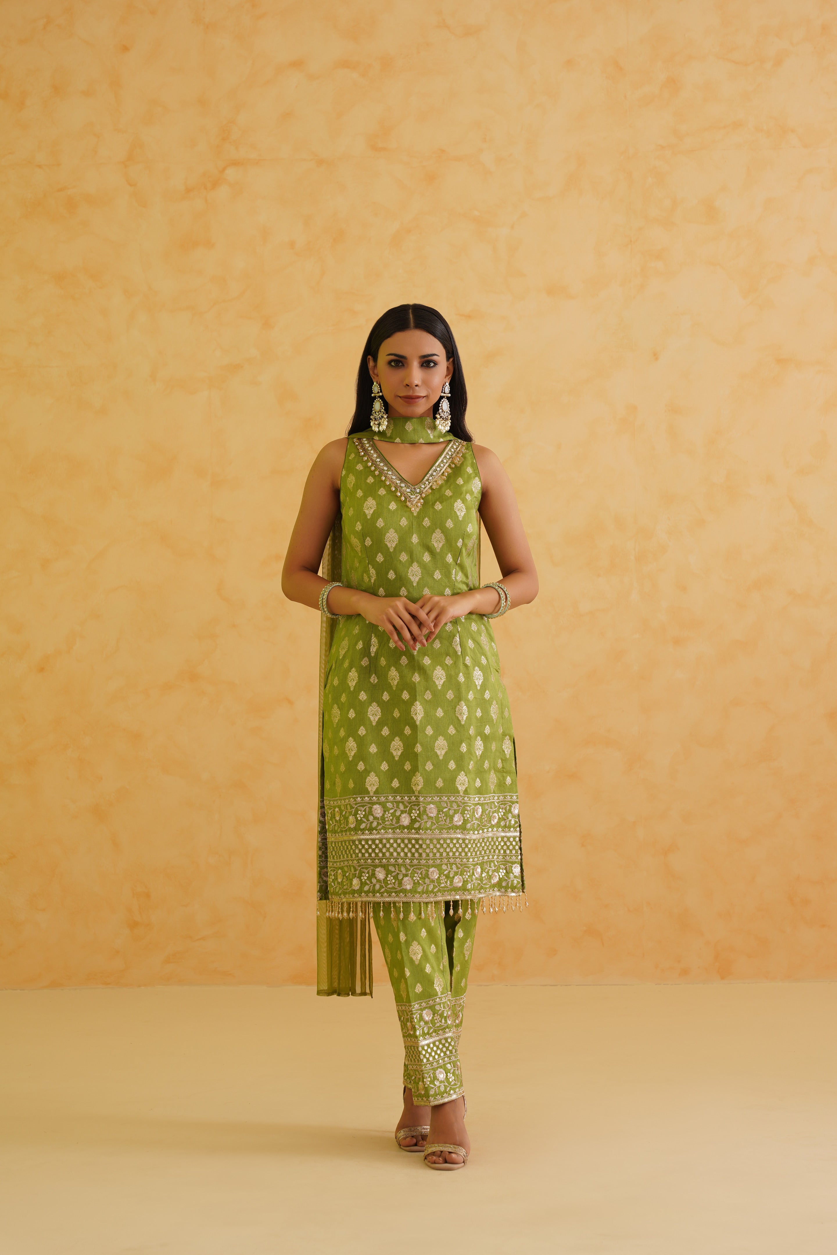 Deepika Chadha's green brocade kurti with intricate crystal, stone, and sequin embroidery.