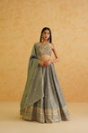 A sophisticated grey georgette lehenga set that exudes elegance and style, perfect for any special occasion.