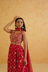 A sophisticated red anarkali set that exudes elegance and style, perfect for any special occasion.