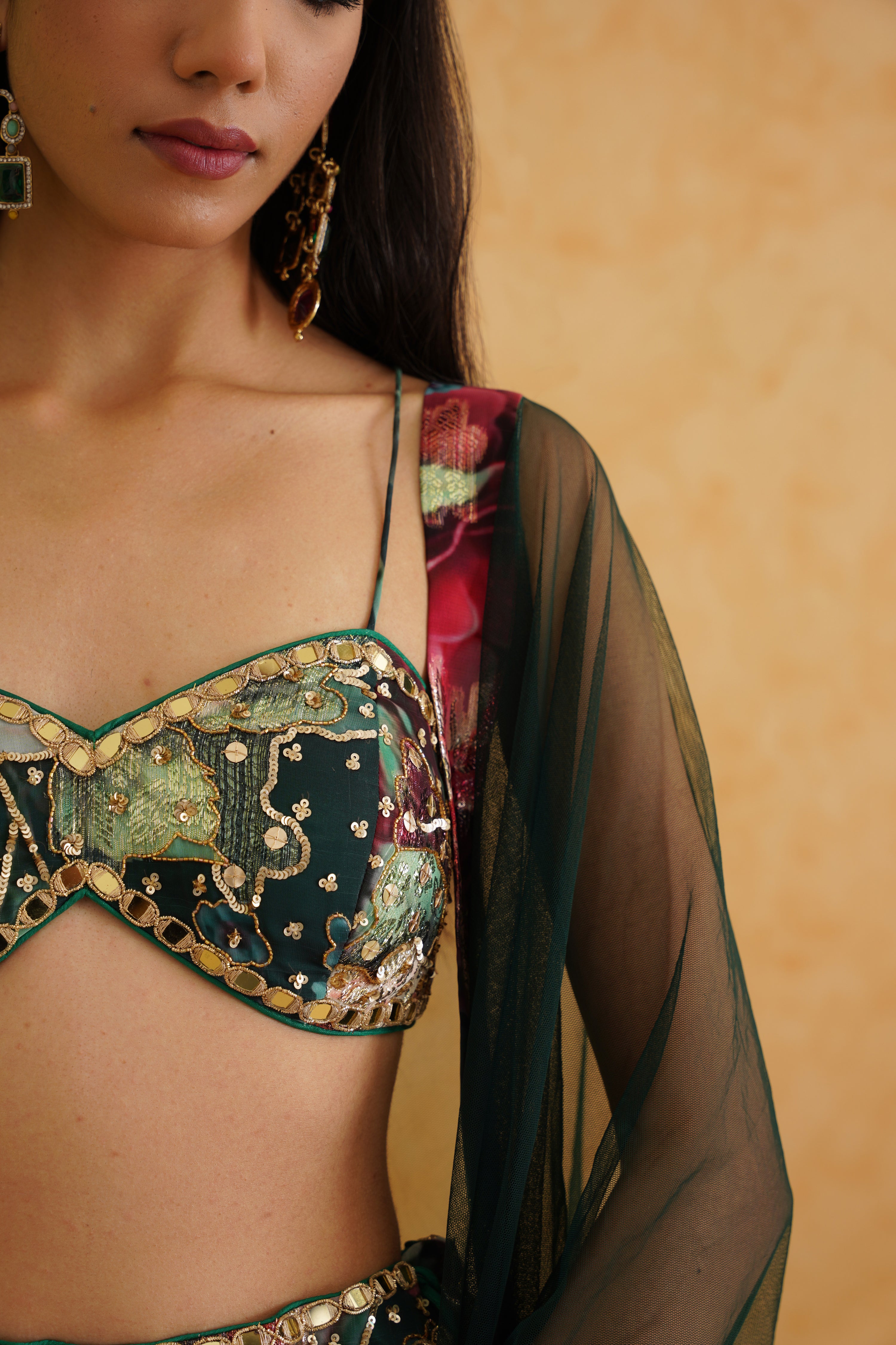 Indulge in Deepika Chadha's luxurious bottle green lehenga. 