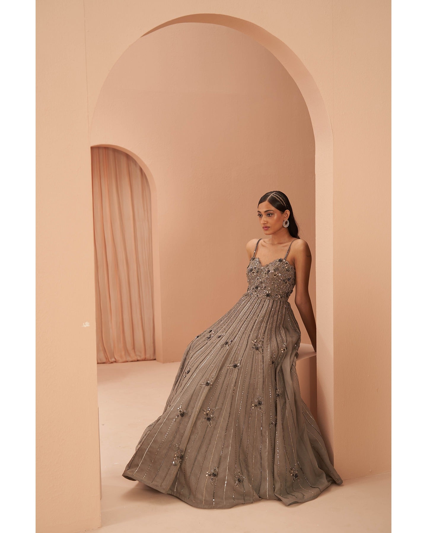 Sophisticated Taupe: Hand-embroidered allure graces this gown, a perfect blend of elegance and timeless charm. 