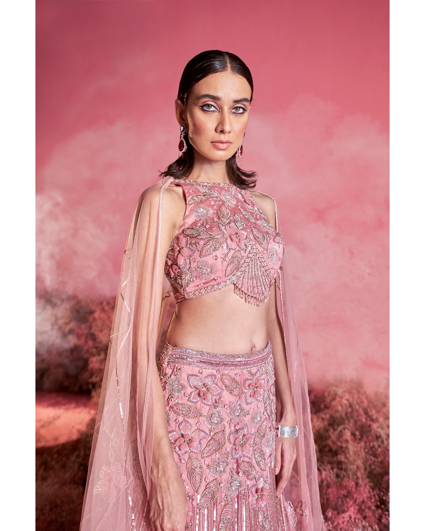 Pink perfection: Unveiling the allure of this stunning lehenga, where elegance meets vibrancy in every twirl.
