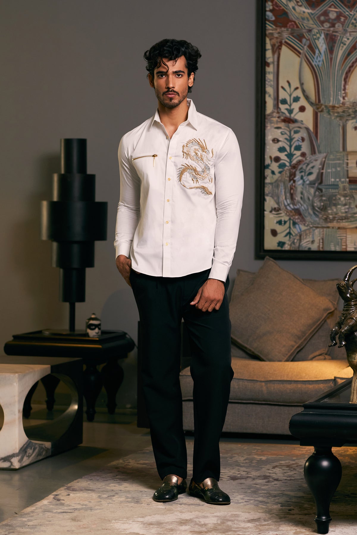  Ivory-colored cotton satin shirt with an intricate embroidered dragon and zipper detail.