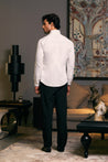 Cotton satin shirt in an ivory shade, highlighted by an embroidered dragon and zipper feature.