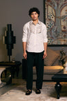 Ivory Cotton Satin Metallic Shirt by GOE: Features Metallic Strip Work on Yoke.