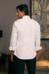 GOE Military-Inspired Shirt in Ivory: Cotton Satin with Pintucks and Pockets.