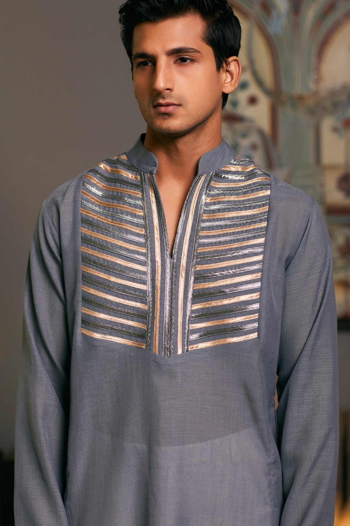 Stylish GOE kurta in a steel metallic shade, blending tradition with a futuristic edge.