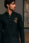 GOE kurta adorned with dragon patterns, blending traditional influences with contemporary fashion