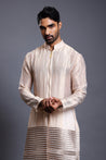 Traditional chanderi kurta sherwani in ivory and gold, adorned with stripwork and crystal rope embellishments.