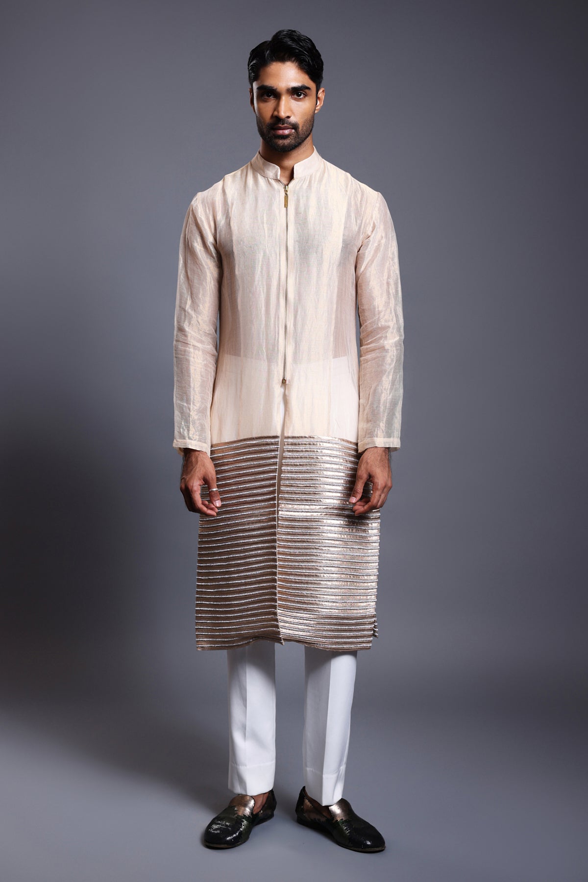 Traditional chanderi kurta sherwani in ivory and gold, adorned with stripwork and crystal rope embellishments.