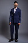 Navy knit suit with gradient self-embedded crystals on the sleeves, blending classic tailoring with modern elegance