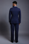 Navy knit suit with gradient self-embedded crystals on the sleeves, blending classic tailoring with modern elegance