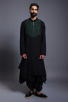 Black blended linen draped kurta with emerald stripwork, crystal rope yoke, and draped dhoti pants for a modern yet traditional look