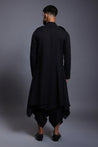 Sophisticated black linen kurta with a sparkling crystal necklace crest, perfect for formal occasions.