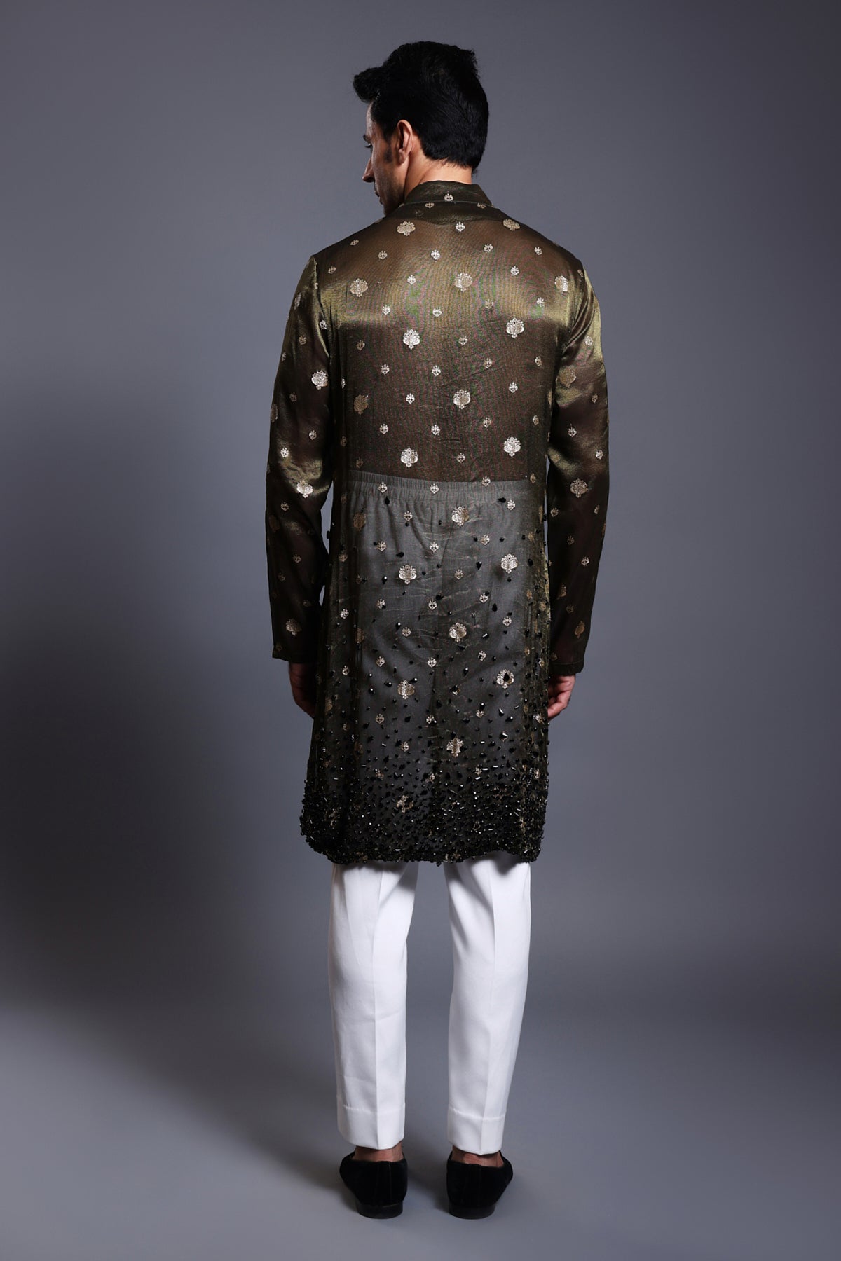 Elegant emerald chanderi kurta sherwani featuring intricate black gradient zircons, perfect for special occasions.