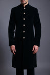 Classic navy velvet sherwani with gold buttons, offering a luxurious and regal look