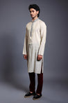 Close-up of ivory chanderi kurta featuring a crystal-adorned collar and detailed placket.