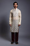 Ivory and gold chanderi kurta featuring a zari and crystal yoke for an elegant look.