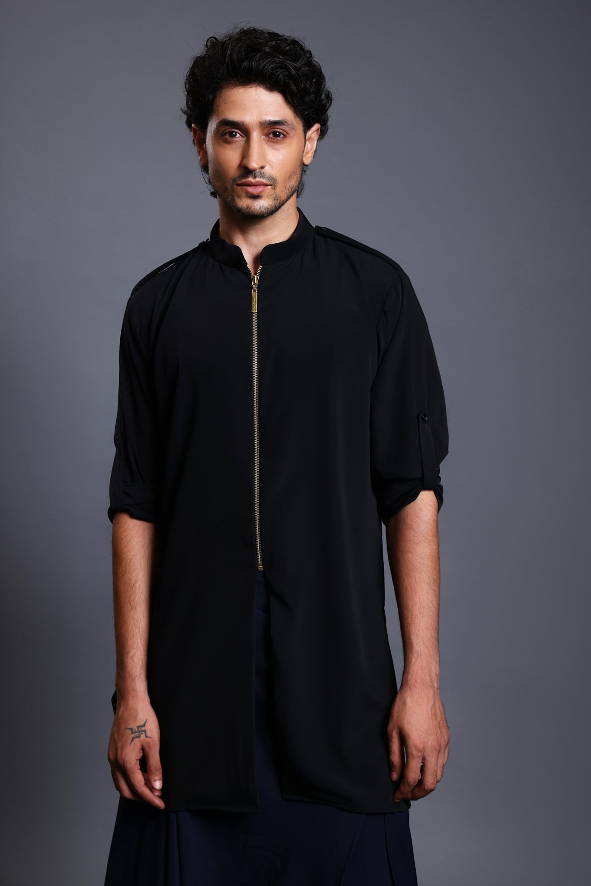 Black microfiber kurta paired with a blue draped pant skirt, blending tradition with modern flair.