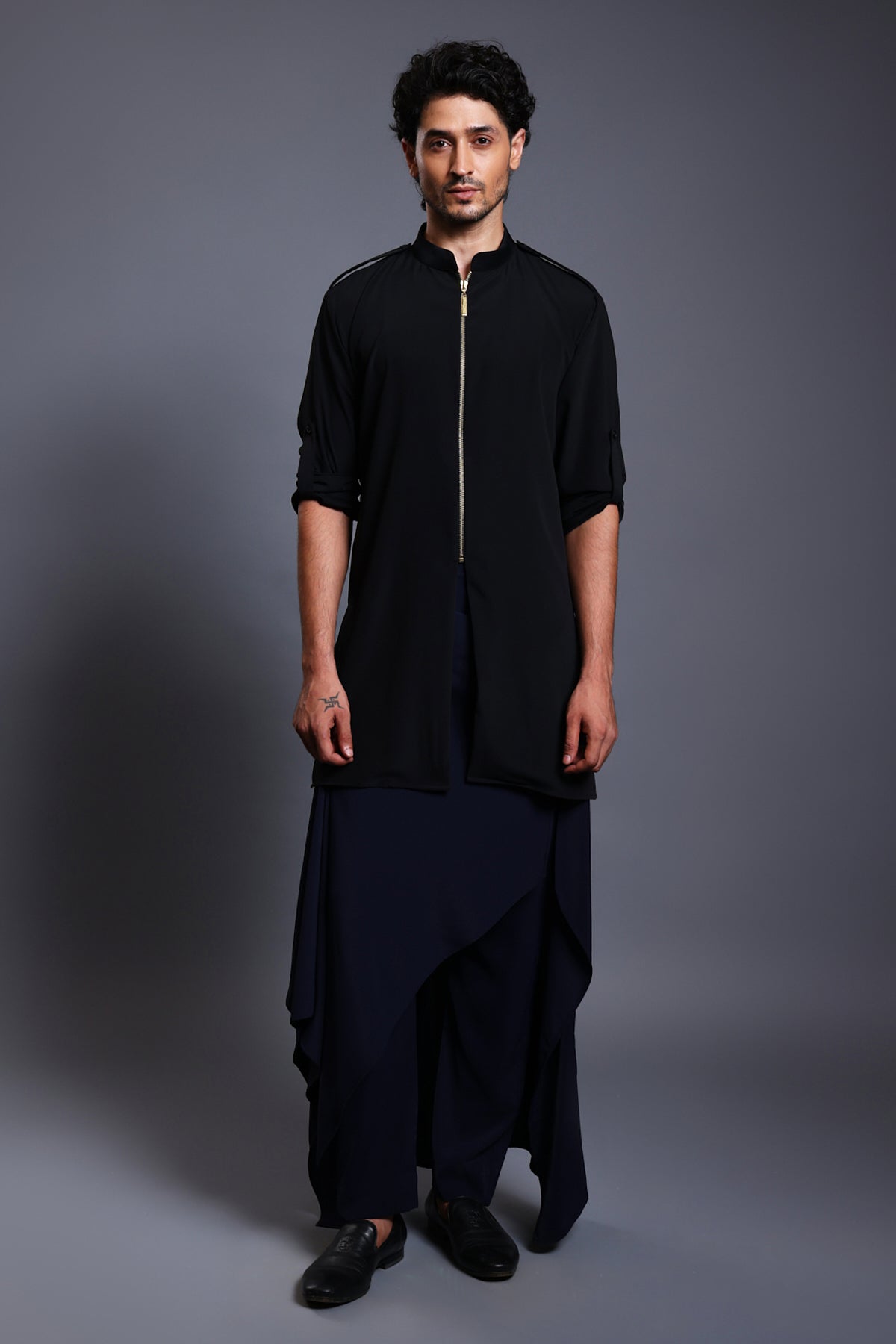 Elegant black microfiber kurta and blue draped pant skirt set, perfect for a fashion-forward ensemble.