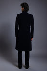 Luxurious black velvet sherwani adorned with subtle gunmetal buttons for a refined and distinguished appearance.