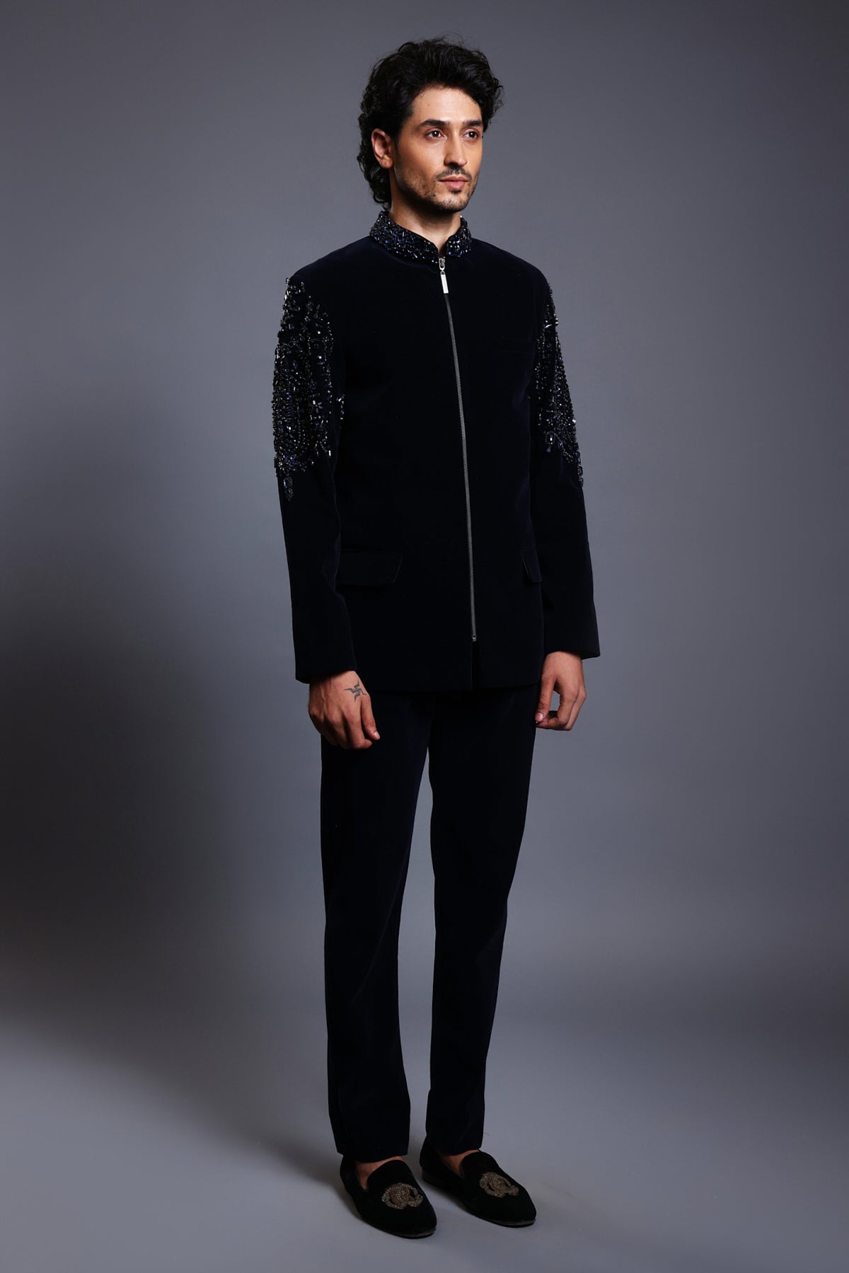 Navy velvet bandhgala featuring elegant crystal work on the sleeves and collar for a refined and luxurious look