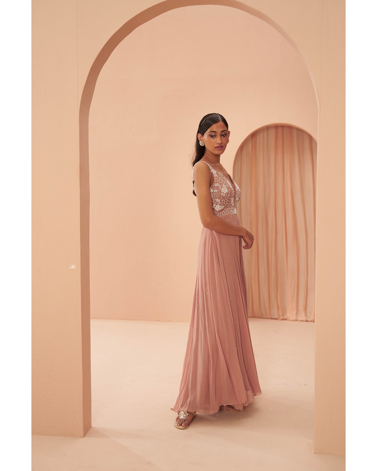 Pink Perfection: Hand-embroidered elegance takes center stage in this chic pink jumpsuit. 