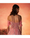 In the spotlight: Dazzling in bright pink, this hand-embroidered gown is a masterpiece of elegance and craftsmanship.