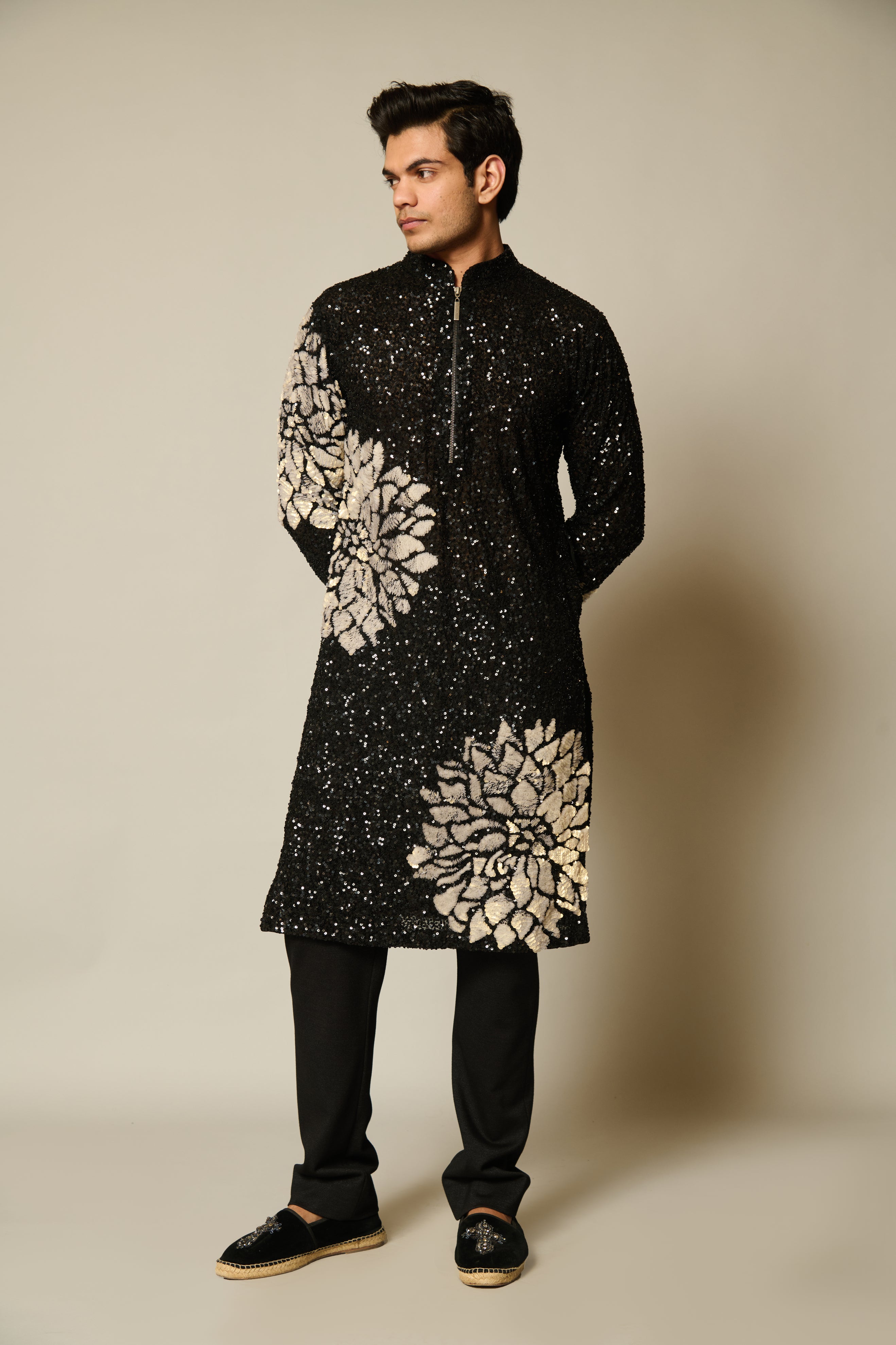 Elegant black kurta with sequin embroidery and stunning ivory 3D floral accents