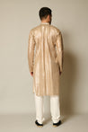 Chic kurta with shimmering gold strips and delicate floral shadow work applique.