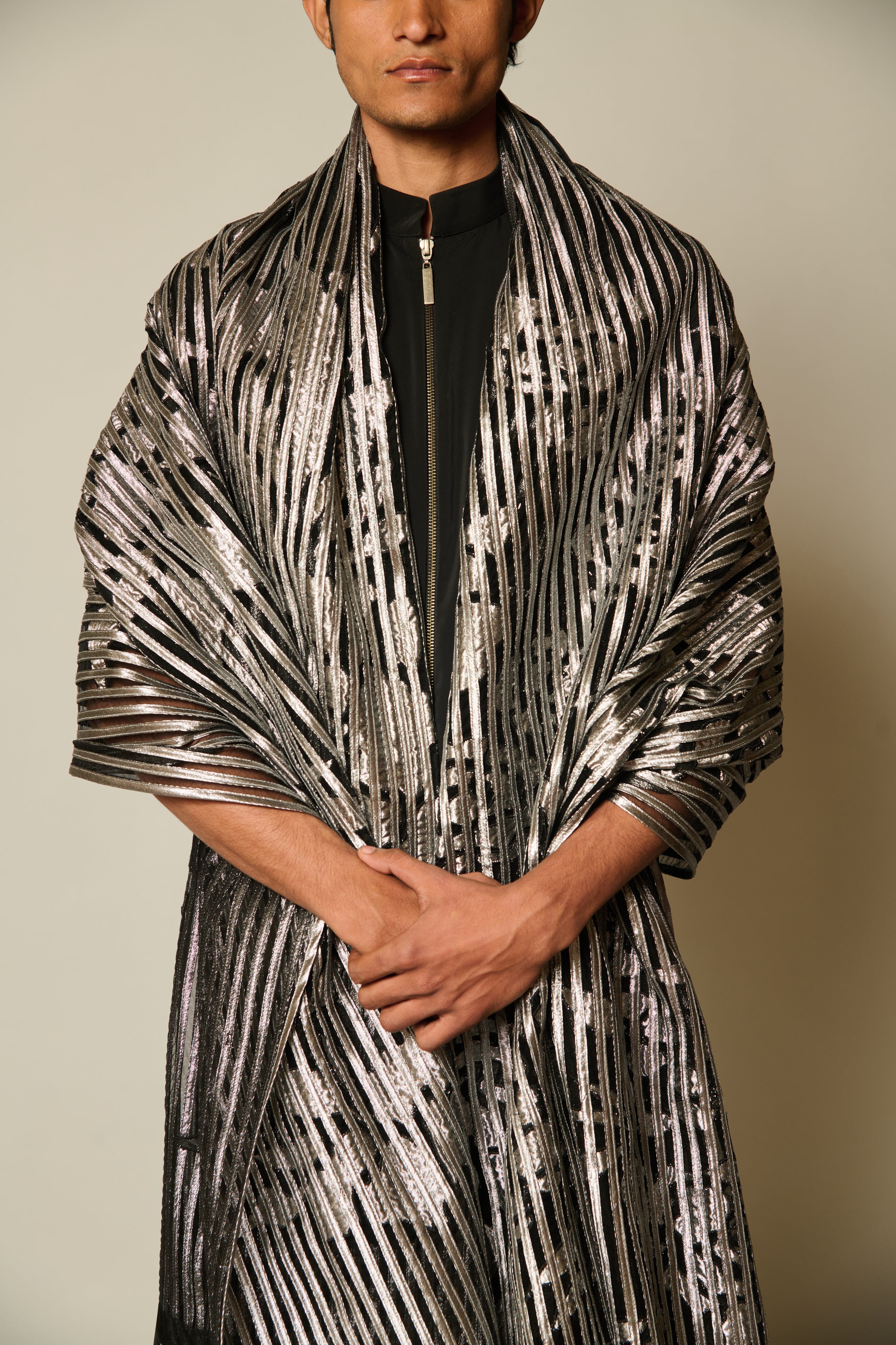 Sophisticated black kurta with a draped microfiber finish, matched with contemporary B&W flap dhoti pants