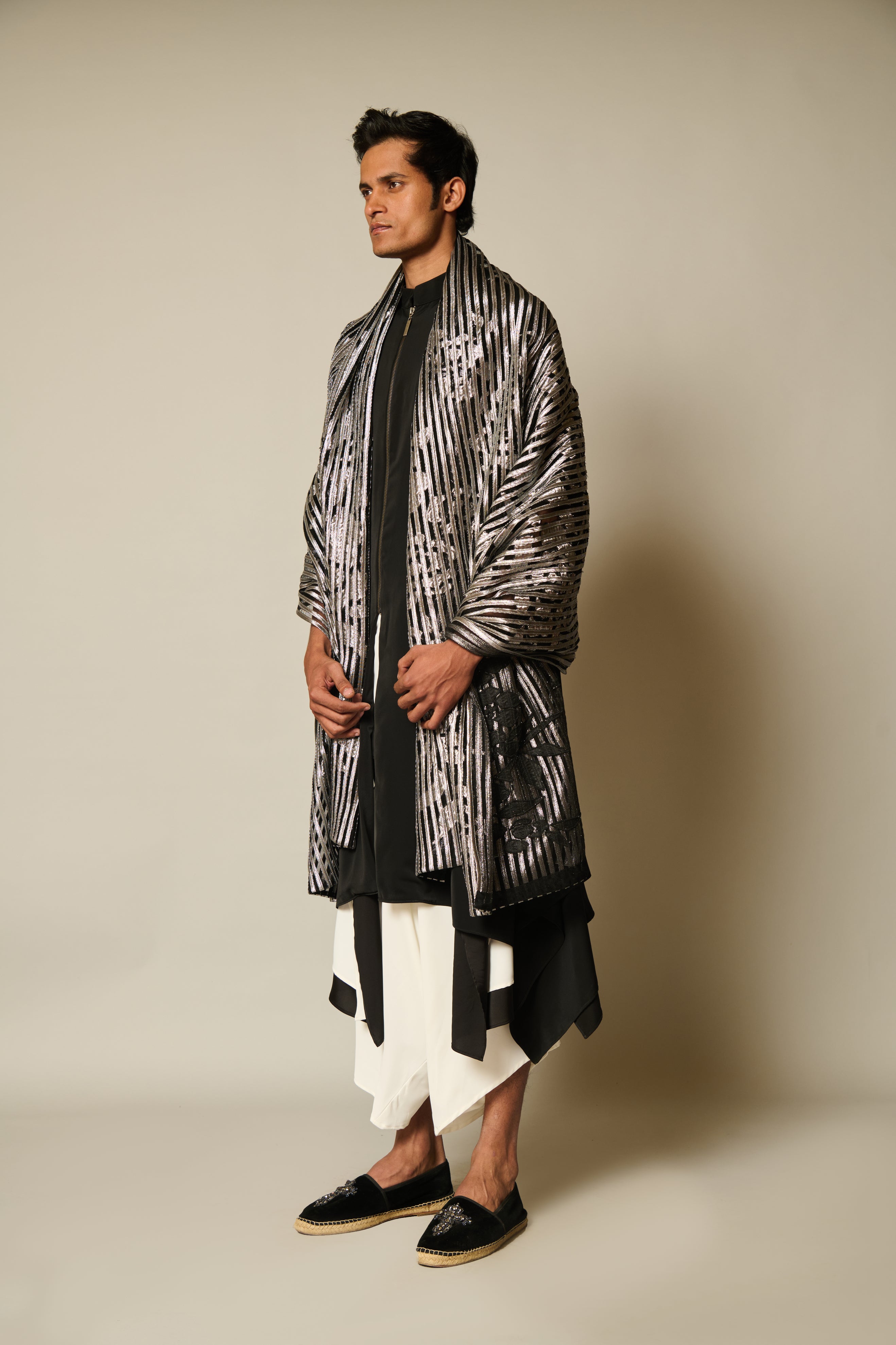 Chic black draped kurta in microfiber, featuring stylish B&W draped flap dhoti pants