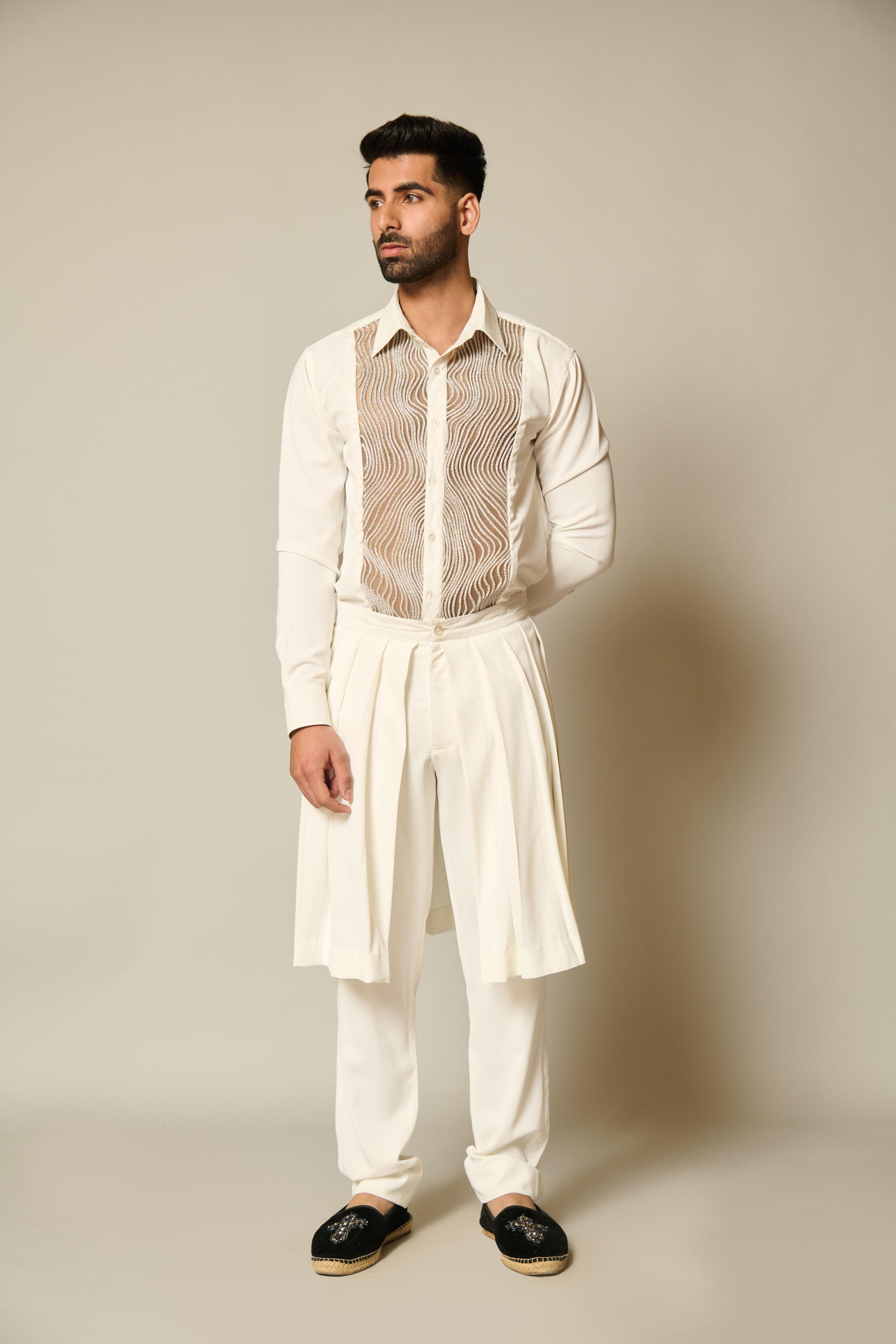 Elegant ivory tuxedo shirt adorned with sophisticated silver crystal rope embroidery.