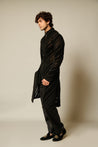 Chic neoprene mesh sherwani adorned with gradient velvet strip work and decorative black crystal rope elements.