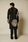 Stylish black kurta with sequin embellishments, highlighted by elegant ivory 3D floral designs