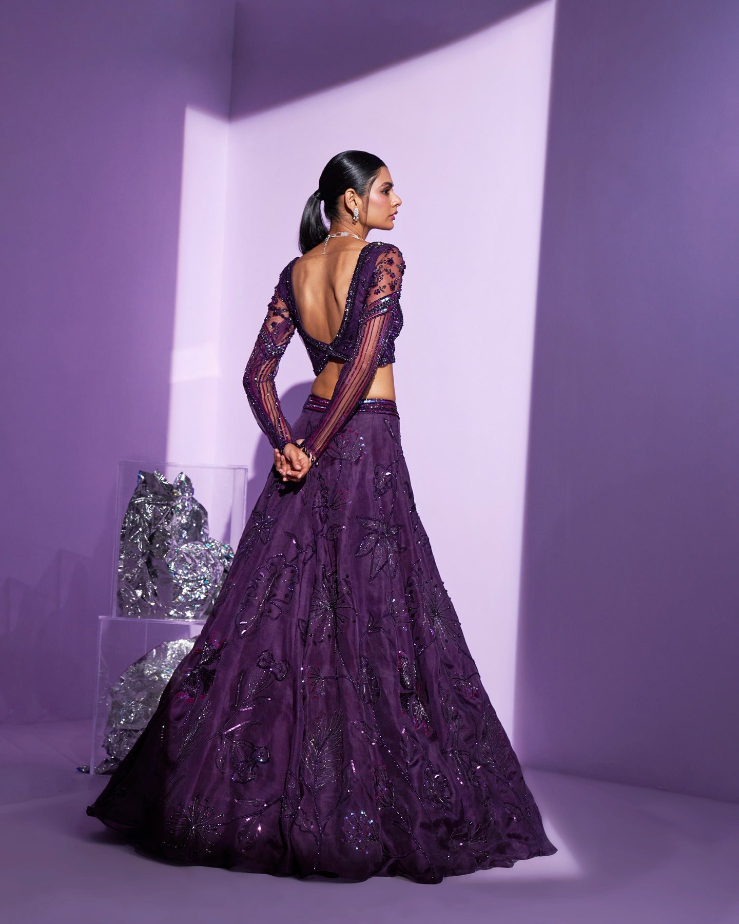 Draped in regal hues, this purple lehenga is a symphony of grace and sophistication. A royal dance of color and intricacy, commanding attention with every twirl. 
