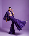 "Draped in regal purple, this pant and suit ensemble with a chic jacket is a royal symphony of style and grace. 